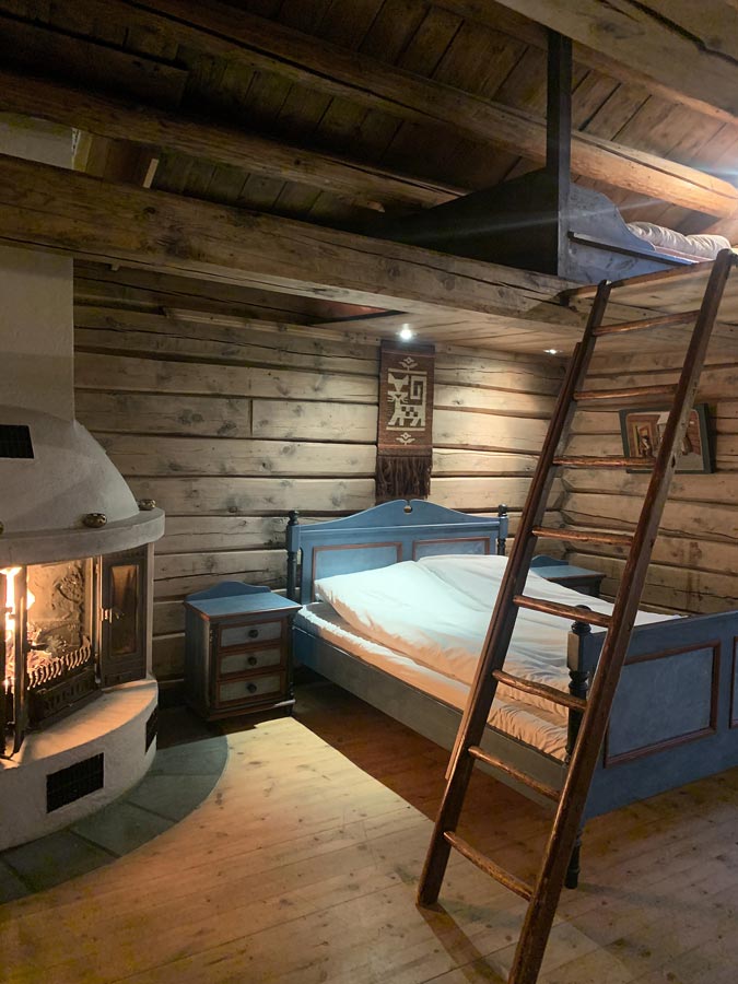  Gamlestua has become a unique bedroom with fireplace.  