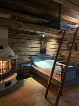  Gamlestua has become a unique bedroom with fireplace.  