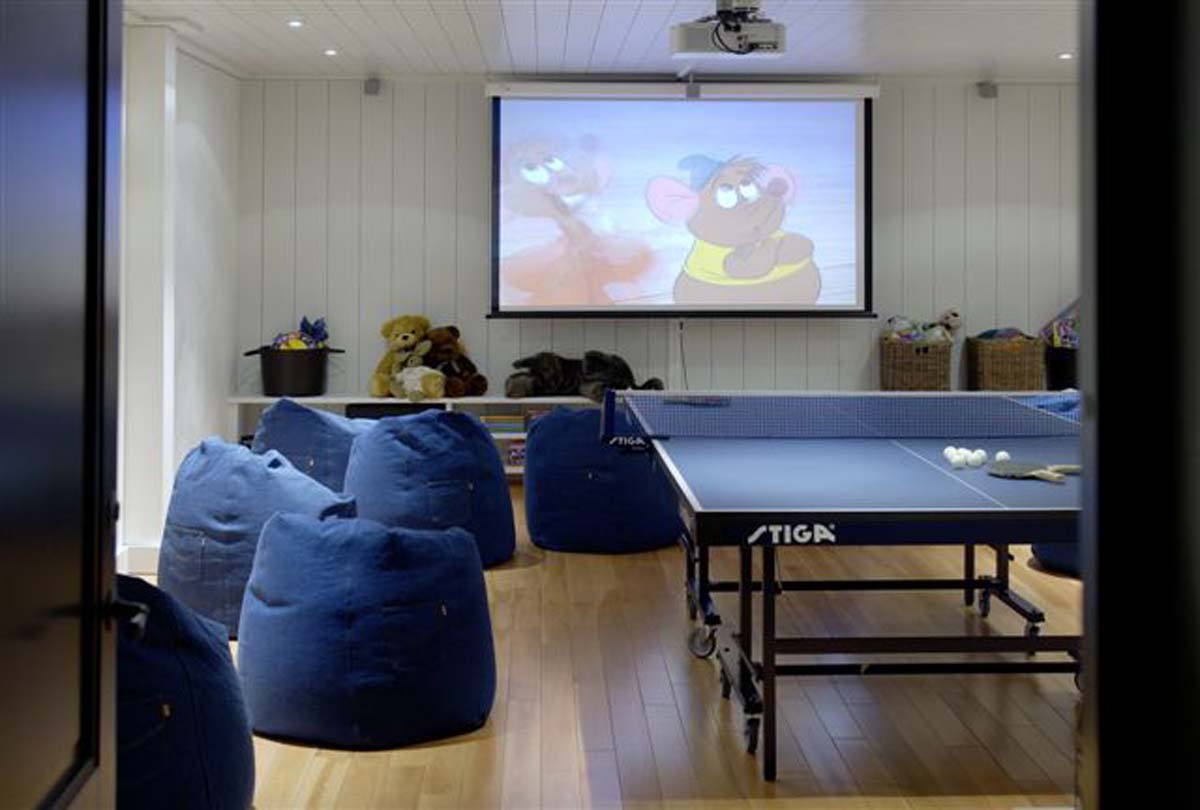  Basement living room with table tennis and home theater. 