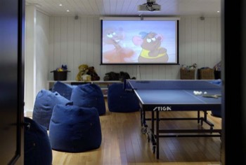  Basement living room with table tennis and home theater. 